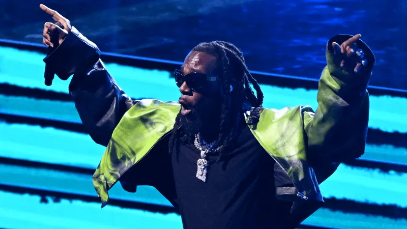 Burna Boy performing at the NBA-All Stars show
