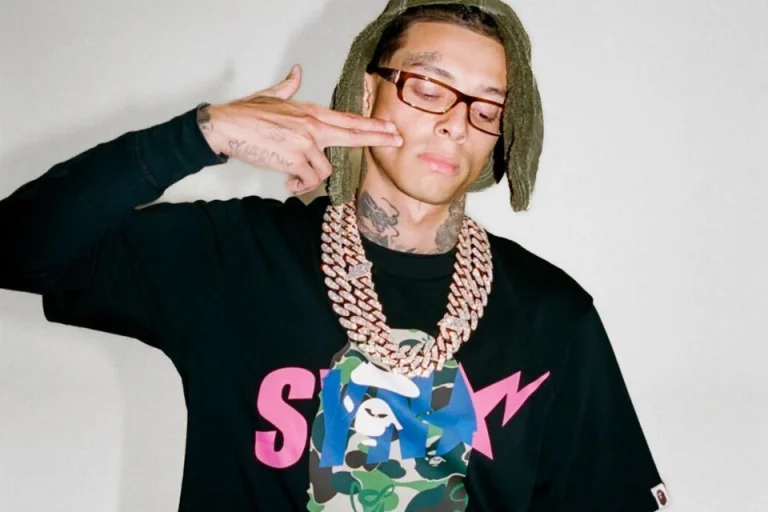 Central Cee modelling for his new partnership with his SYNA World brand alongside Bape and Spotify