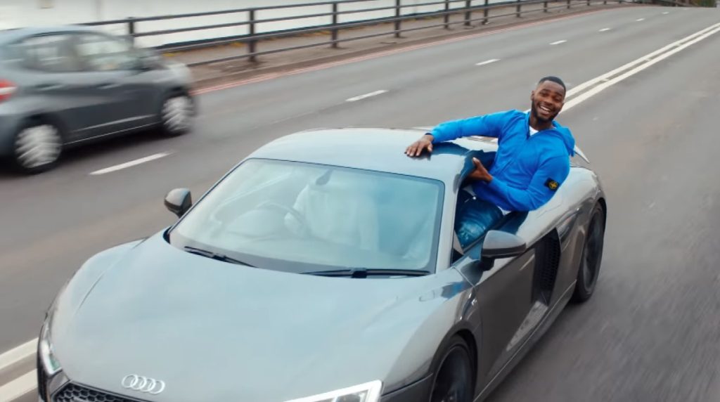 Dave performing in a music video