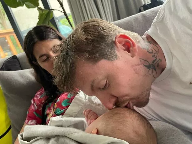 Professor Green, real name Stephen Manderson with his Karima McAdams and son Slimane.