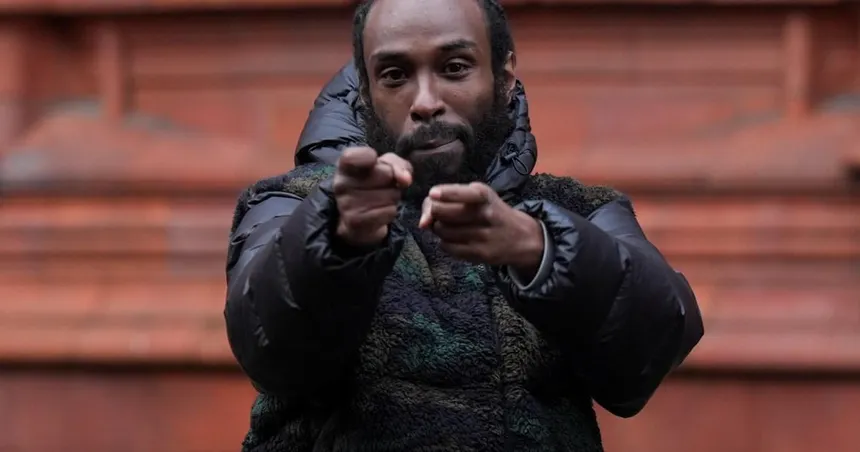 Twista Cheese leaving a Birmingham Court with gun signs