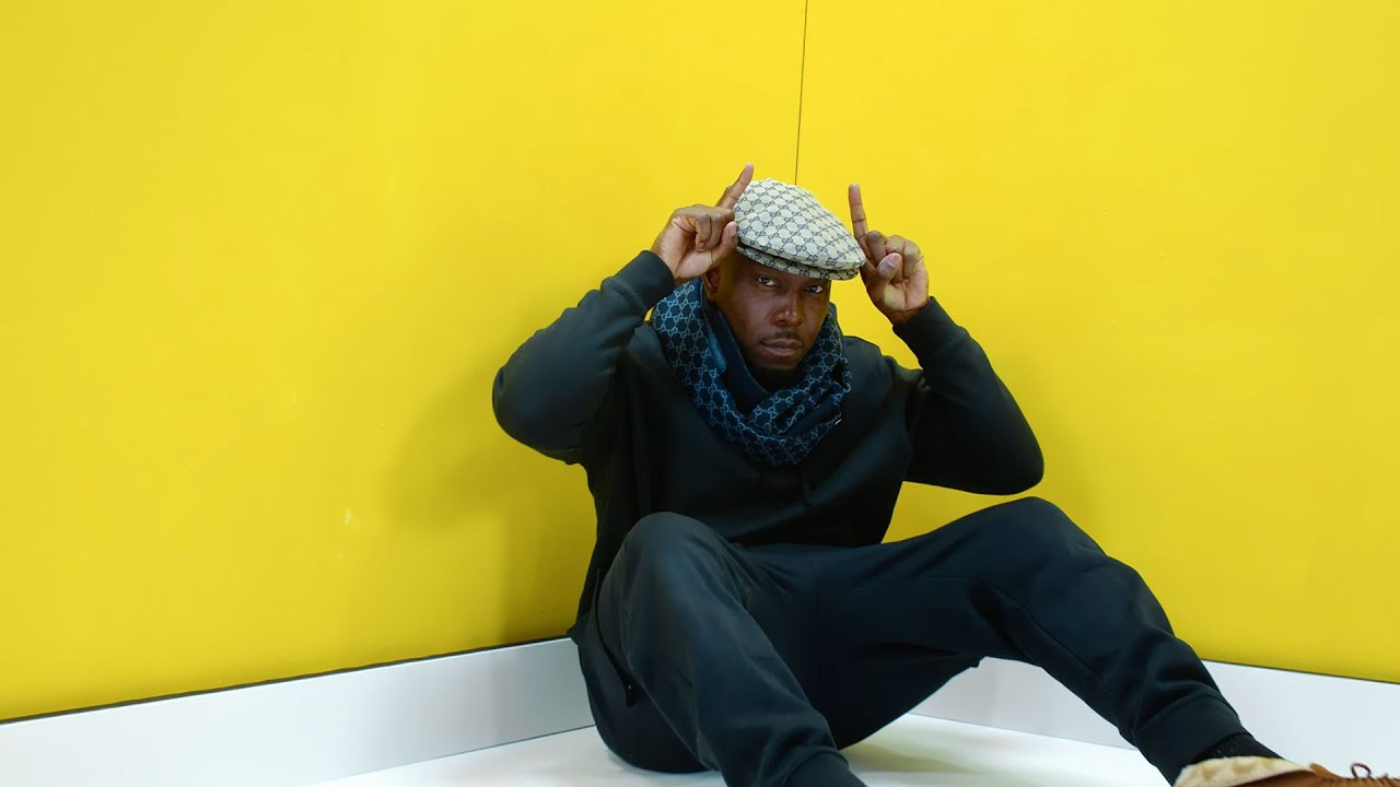Dizzee Rascal posing retropctively on the set of his beloved album 'Boy In The Corner'